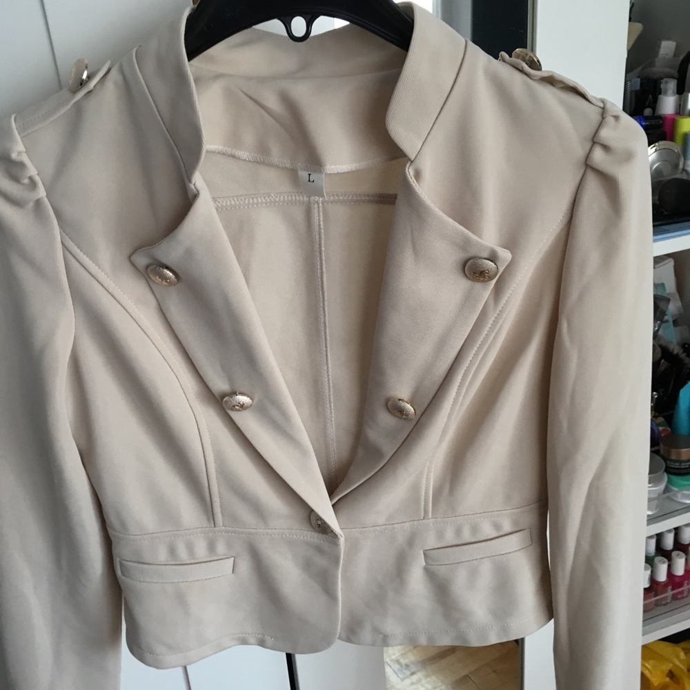 Beige vest/jacket with gold buttons